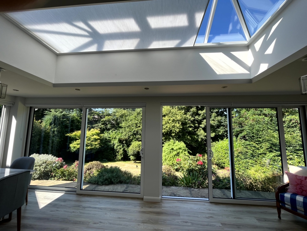 Grey roof lantern blind facing to the garden